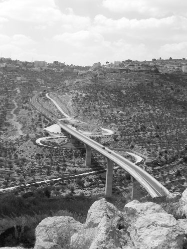New West Bank settler road, with curvy local Palestinian road beneath.