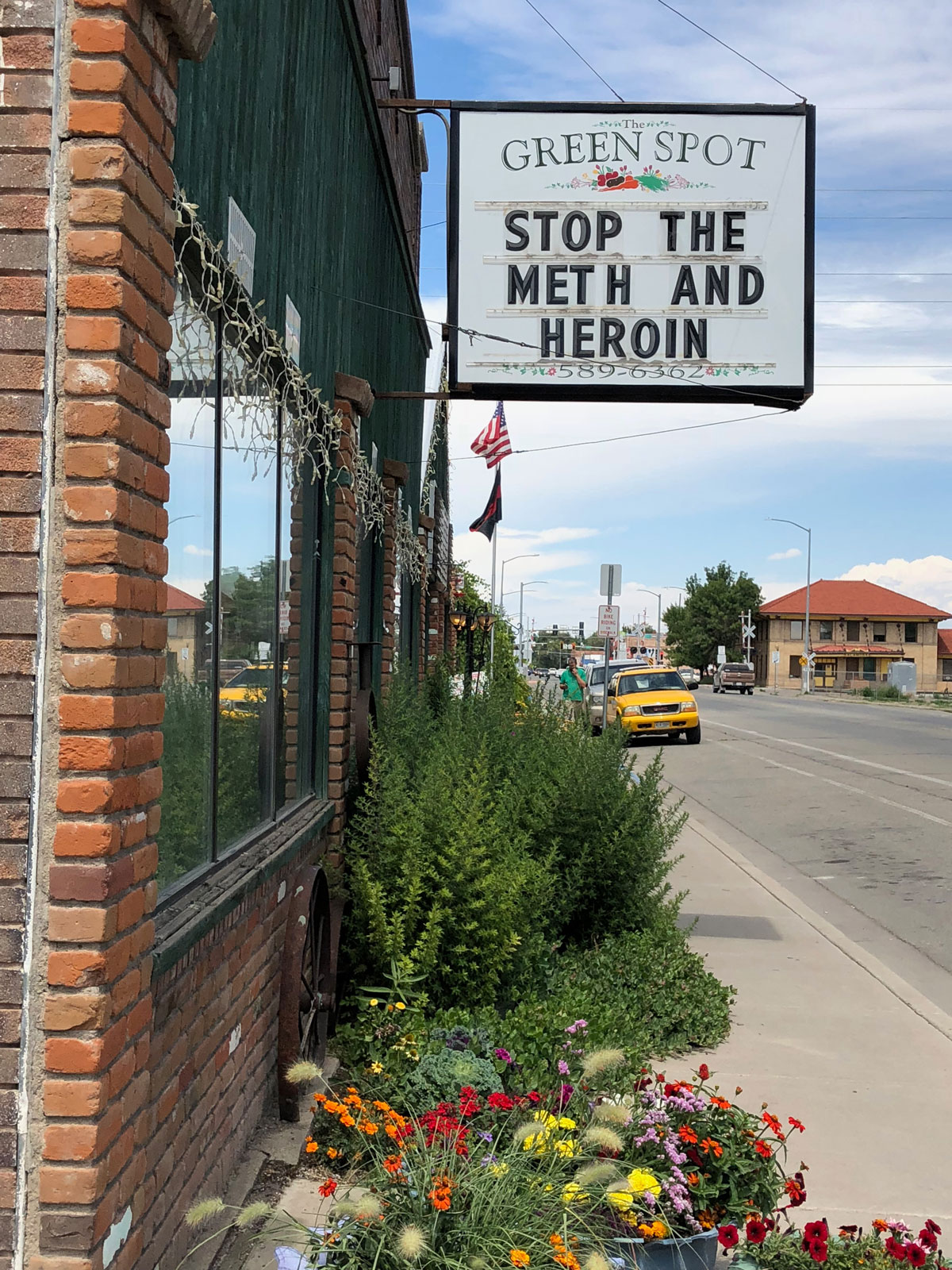 sign in town that says "stop the meth and heroin"