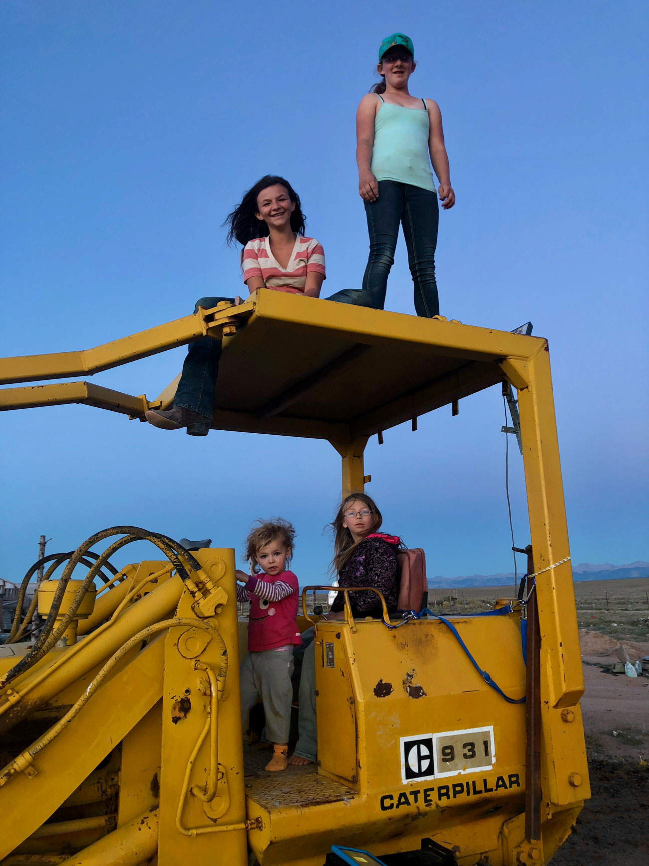 4 girls on tractor